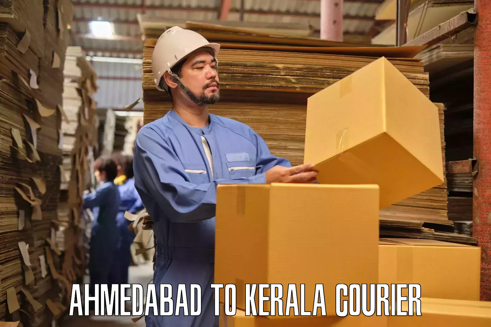 Household goods delivery Ahmedabad to Karunagappally