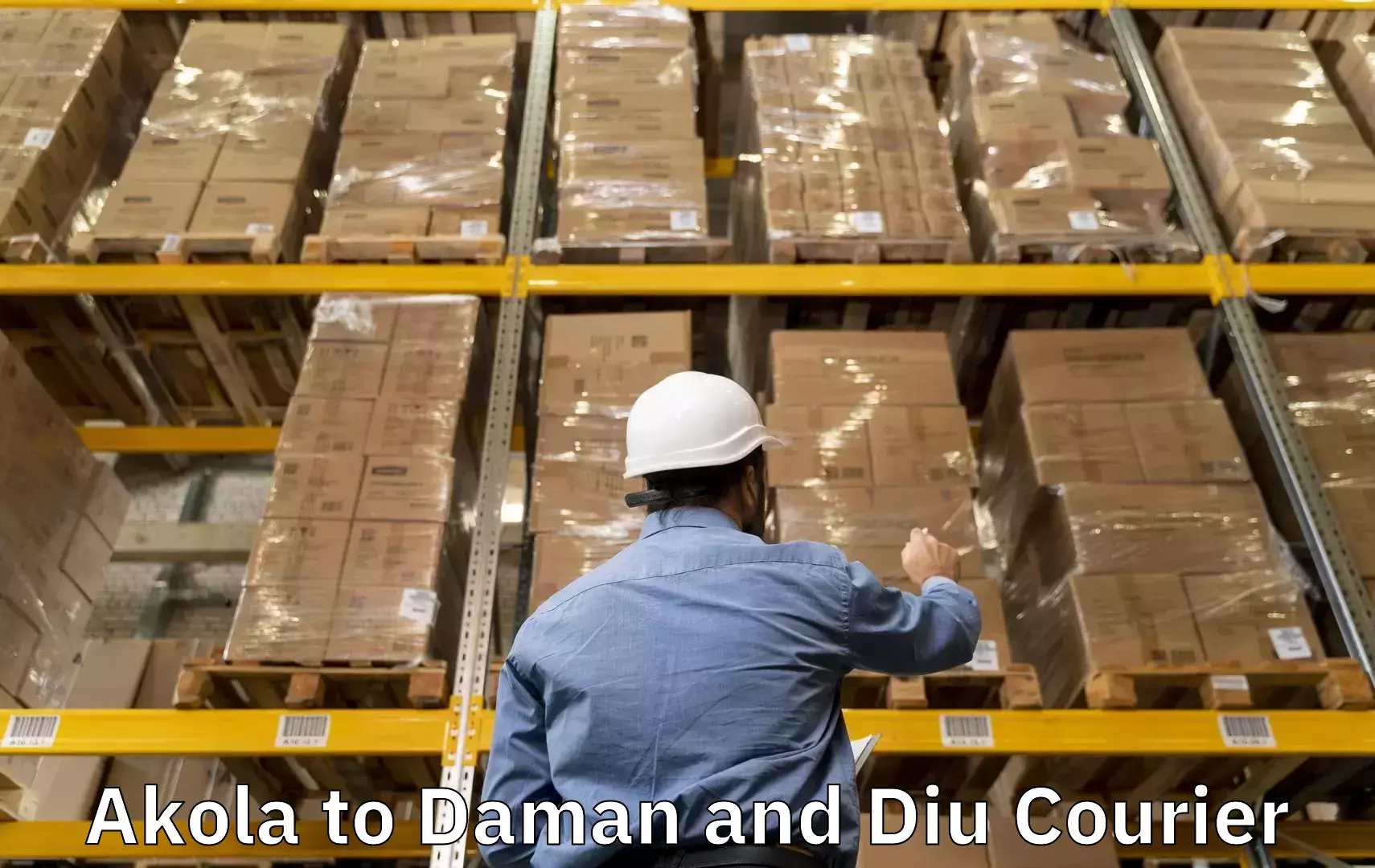 Electronic items luggage shipping Akola to Daman and Diu