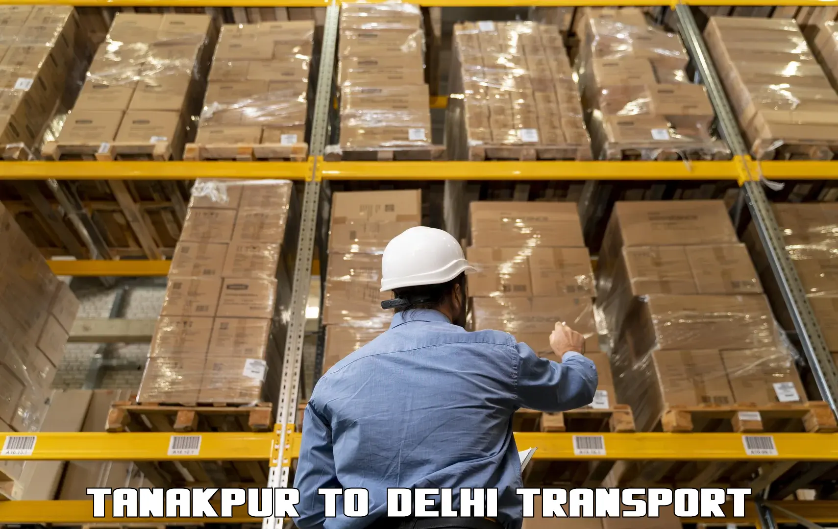 Air freight transport services Tanakpur to Delhi Technological University DTU
