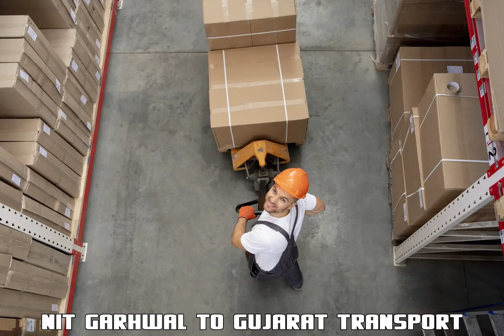 Lorry transport service NIT Garhwal to Bharuch