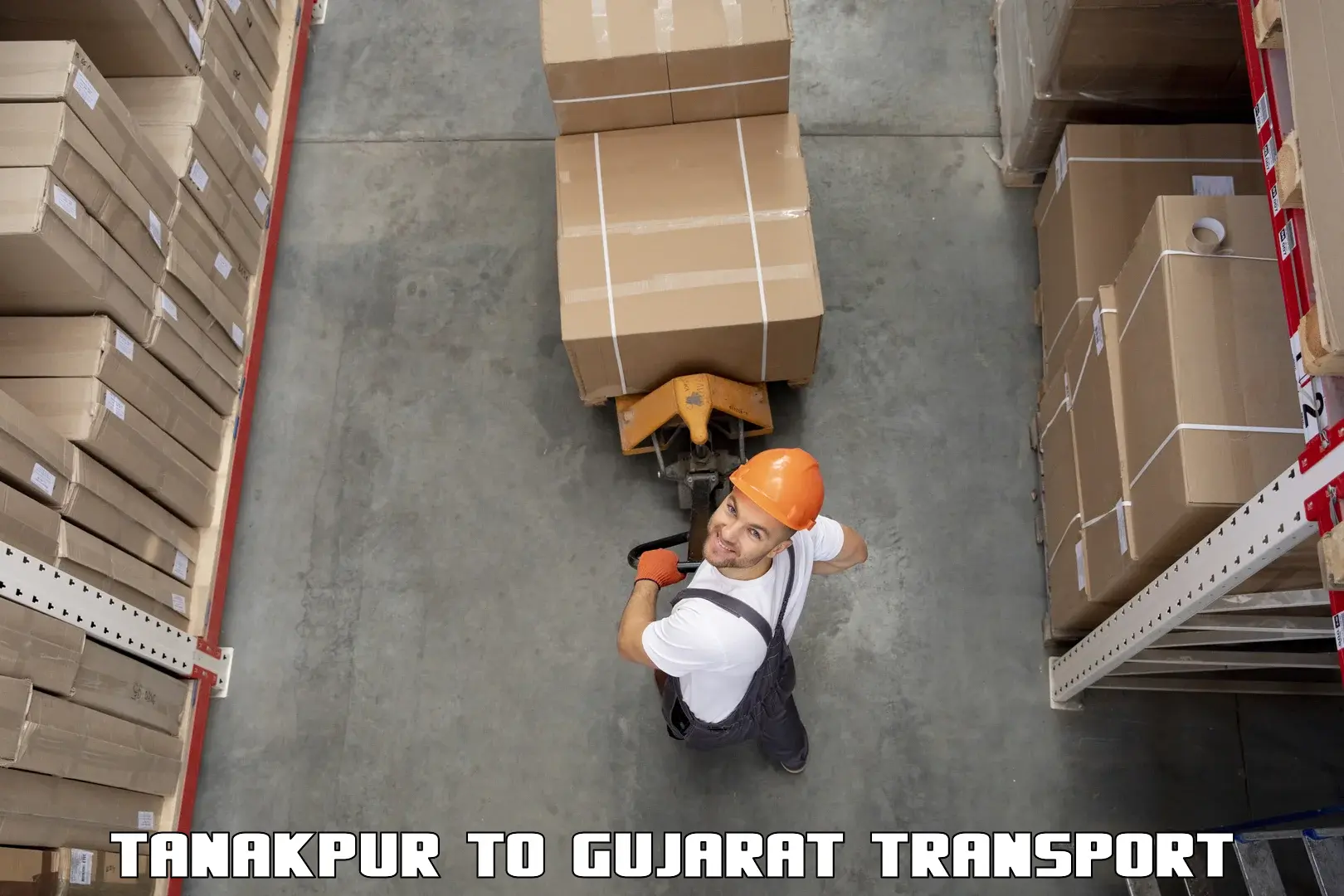 Luggage transport services Tanakpur to Kalol Gujarat