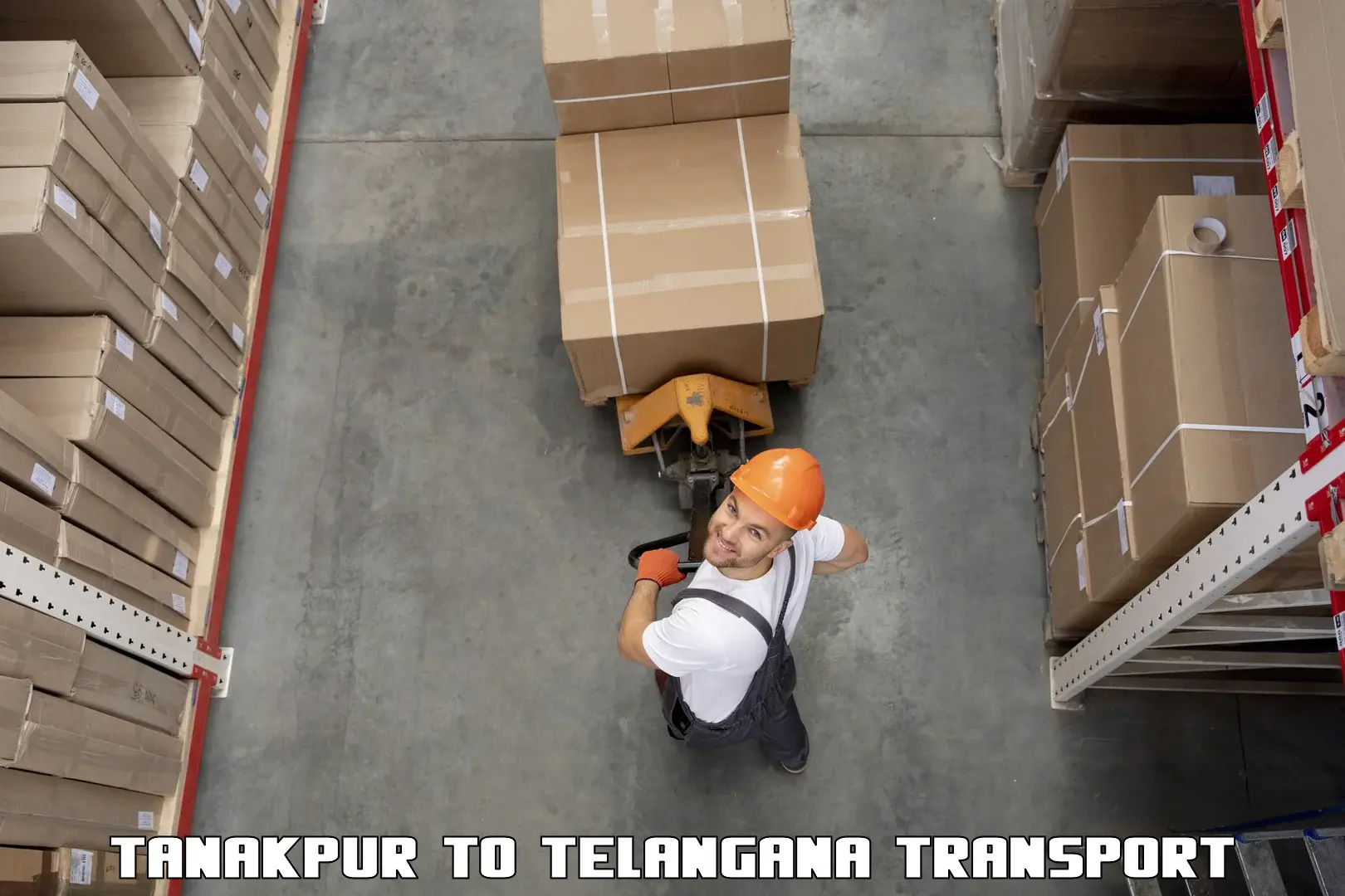 Two wheeler parcel service Tanakpur to Telangana