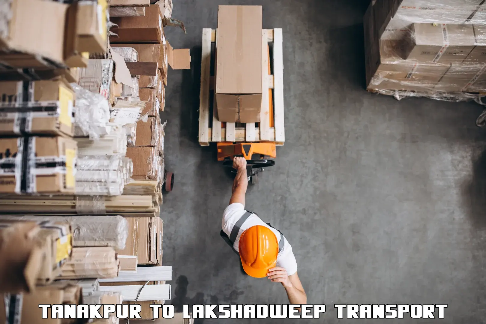 Two wheeler transport services Tanakpur to Lakshadweep