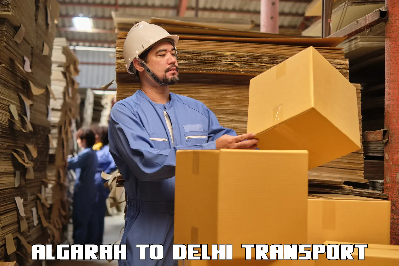 Pick up transport service Algarah to Jawaharlal Nehru University New Delhi