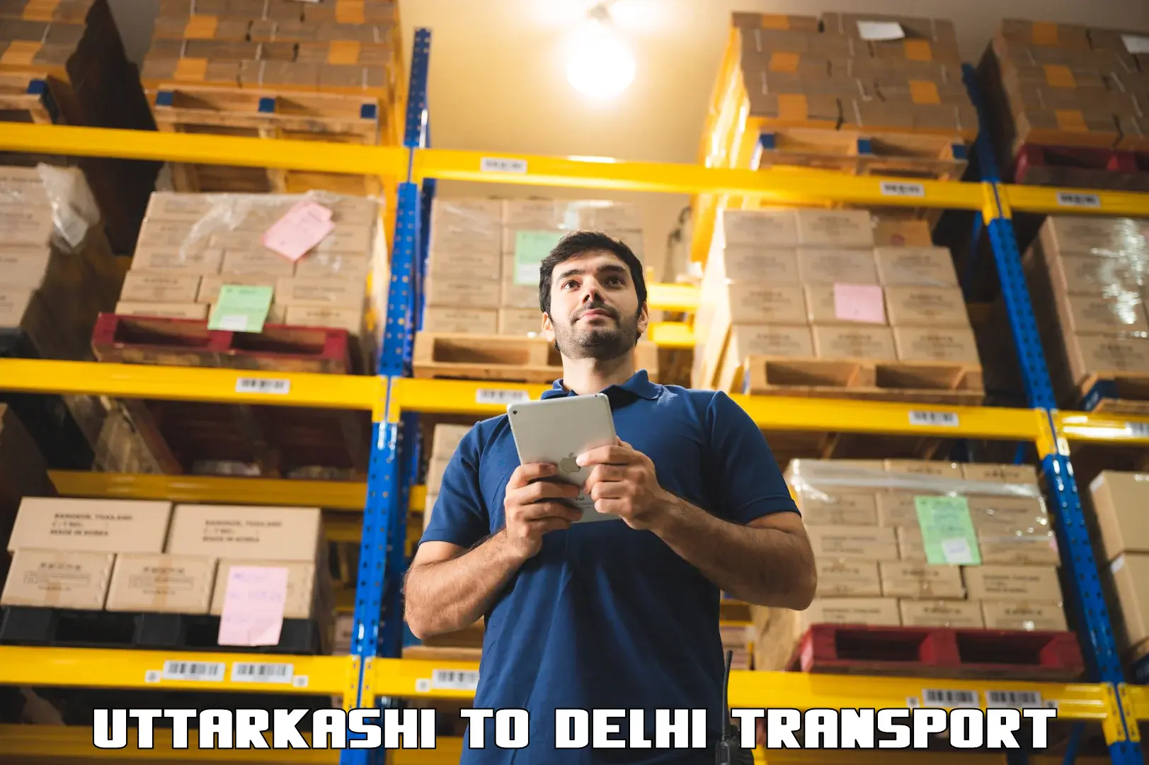Two wheeler parcel service Uttarkashi to Ramesh Nagar